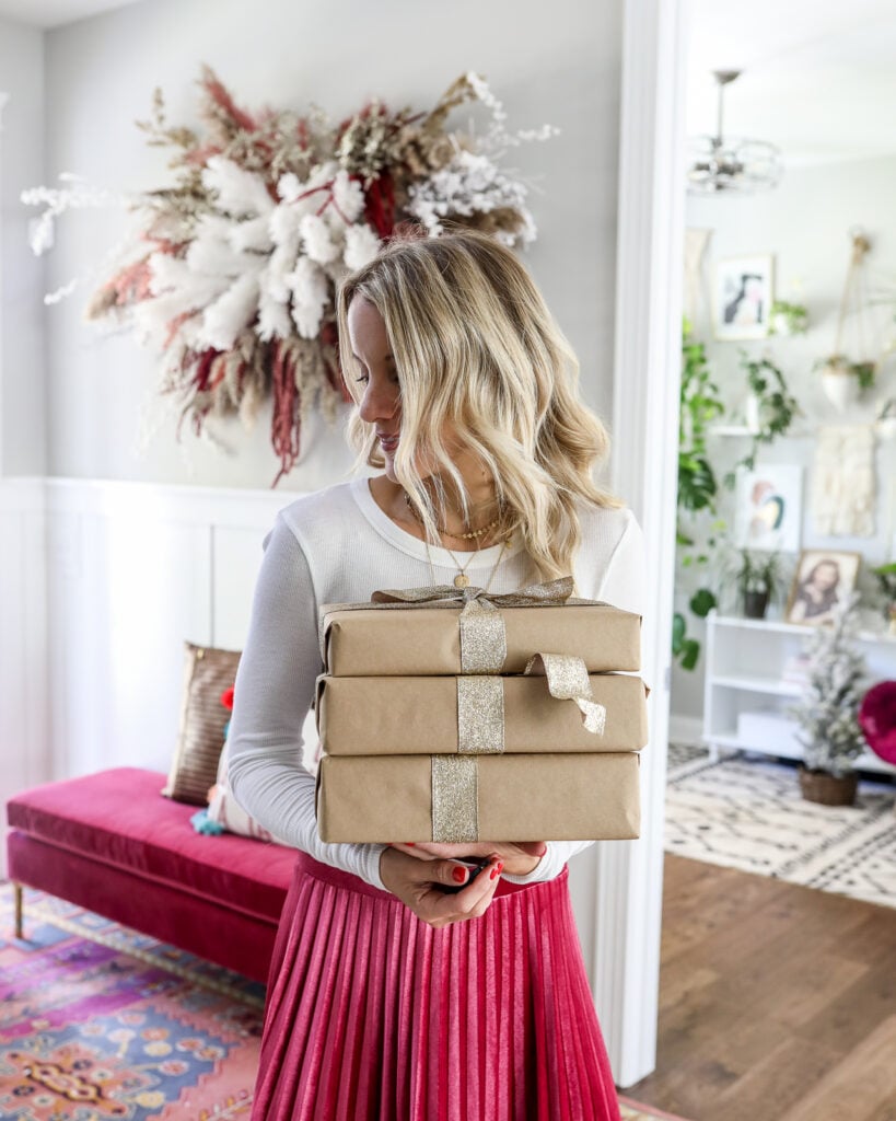 Woman holding Christmas gifts