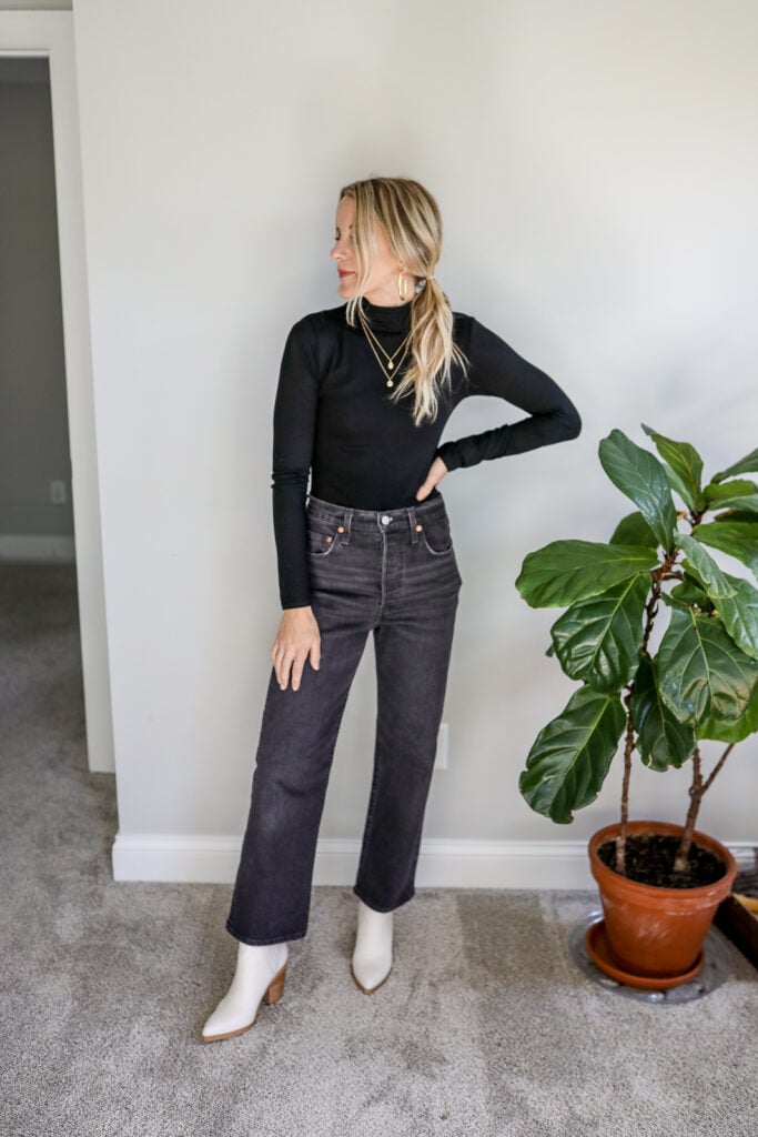 Girl Wearing Wide Leg Cropped Jeans + Black Top