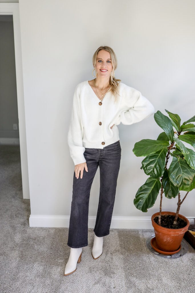 white cardigan sweater and grey pants