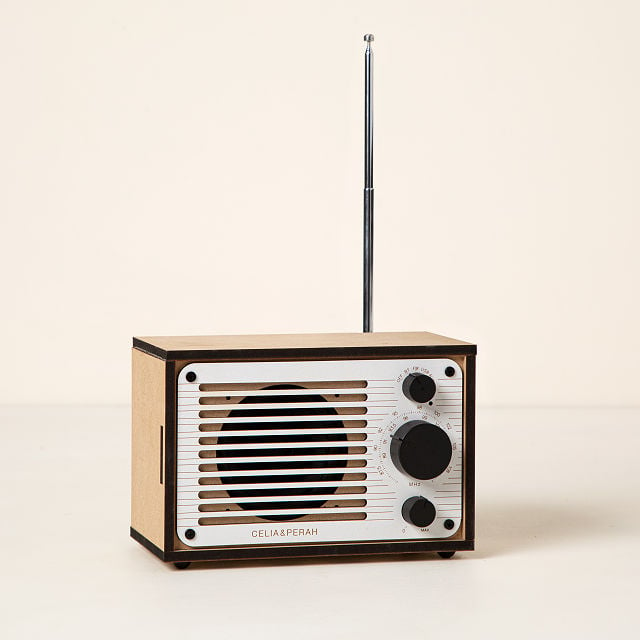 Radio with antenaa and 3 knobs