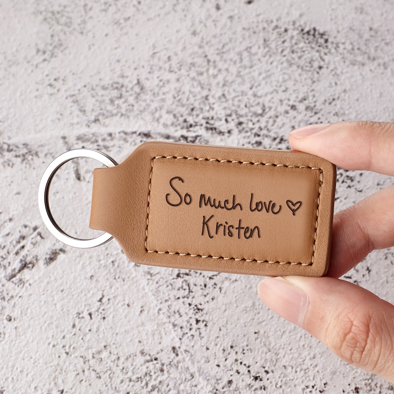 Leather keychain that says "So much love" Kristen