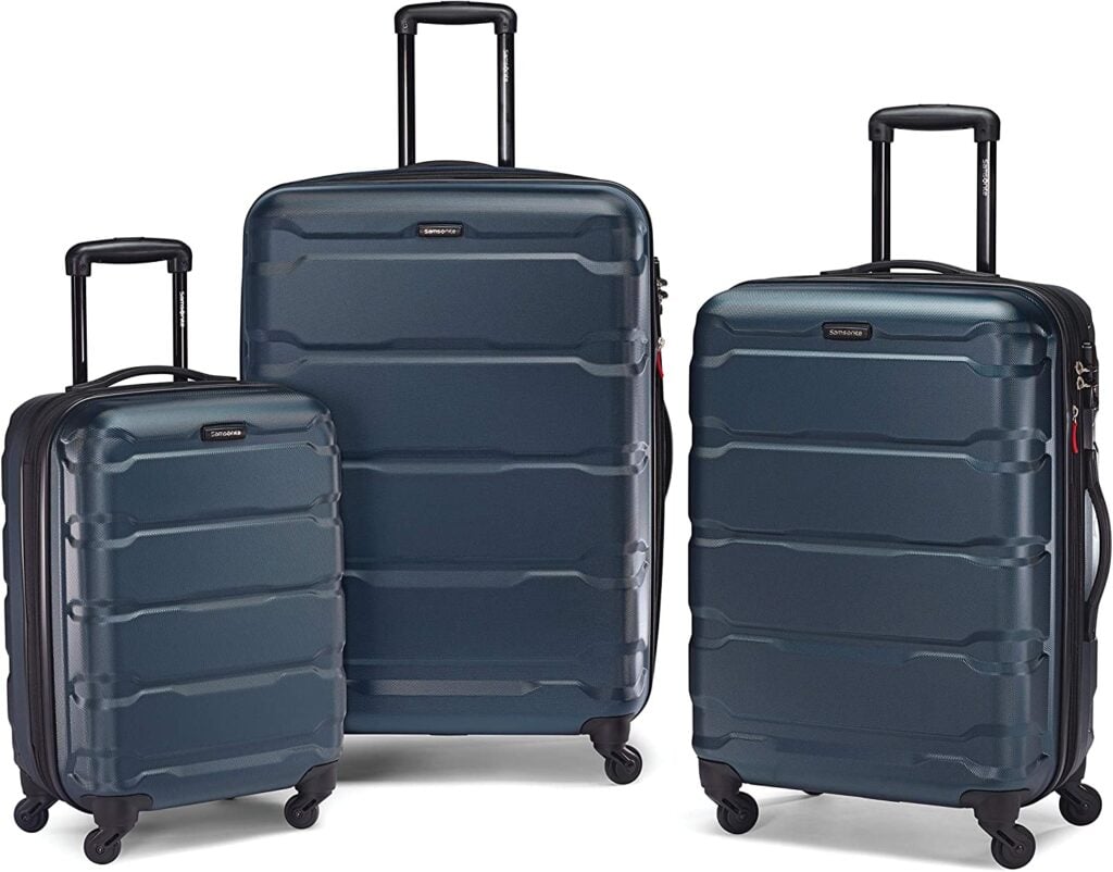 3 different size pieces of luggage in dark blue