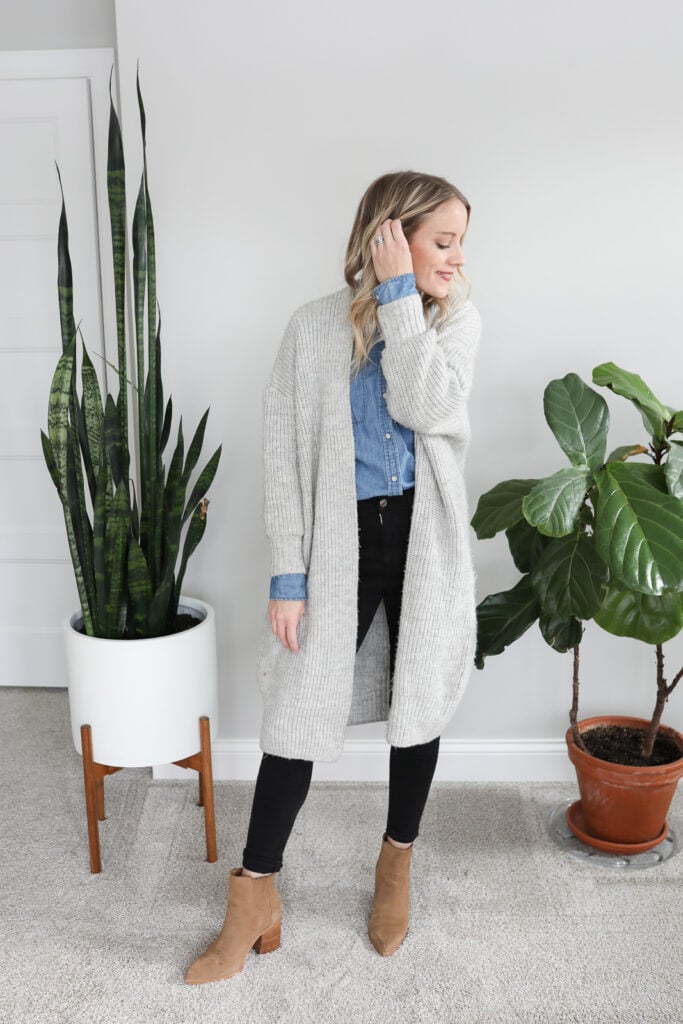 long cardigan layered over denim shirt