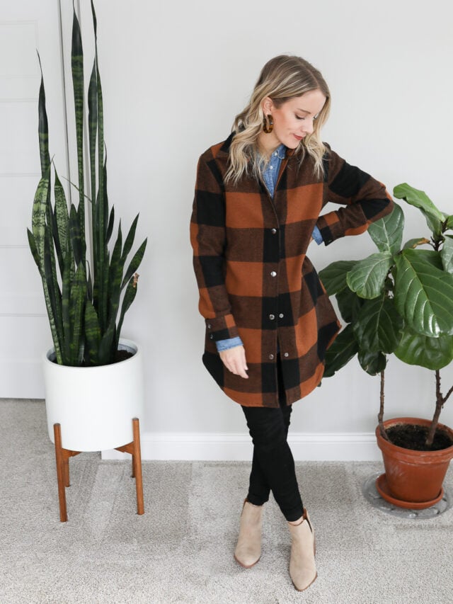 denim shirt with long jacket over with black jeans and tan booties