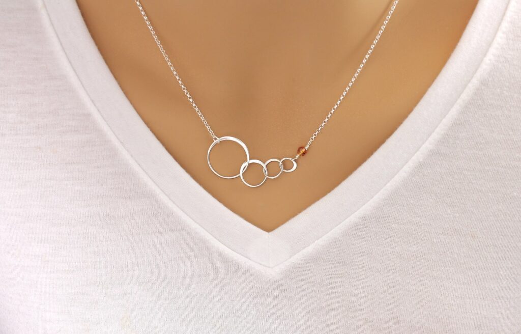 Necklace with 4 circles and a birthstone