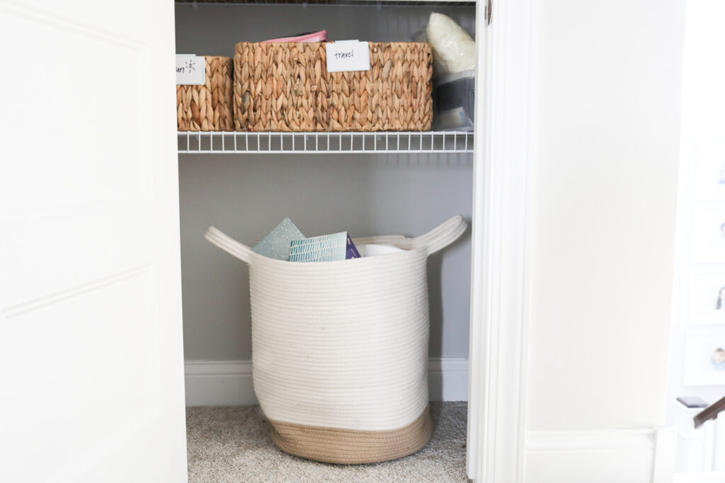 linen closet basket with toilet paper