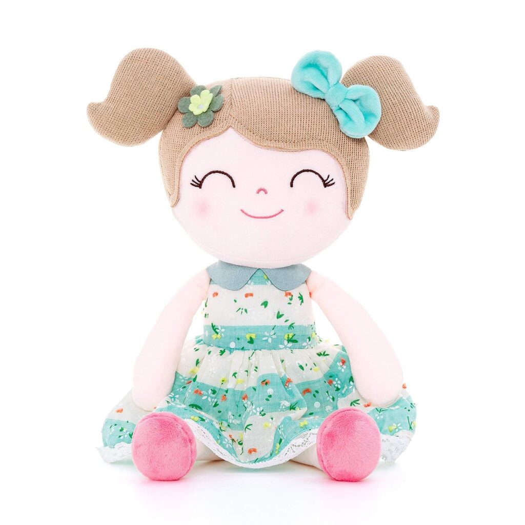 Little girl doll with pigtails and floral dress from Gloveleya