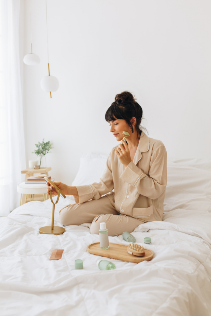 woman using jade roller