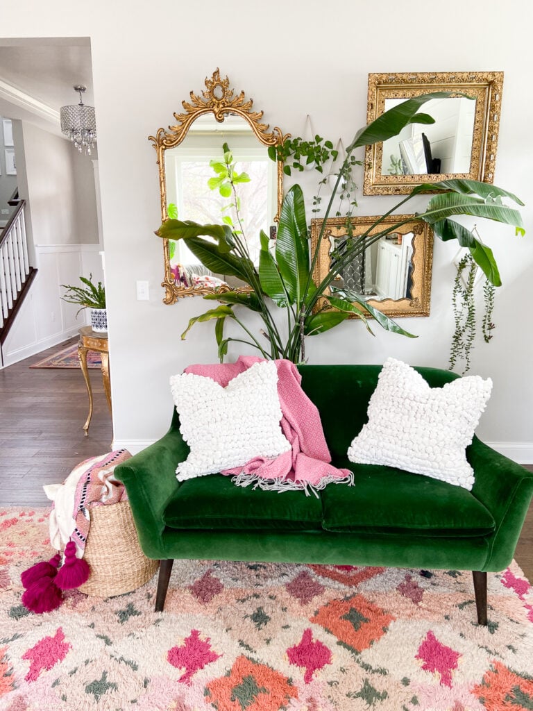 living room with vintage mirrors