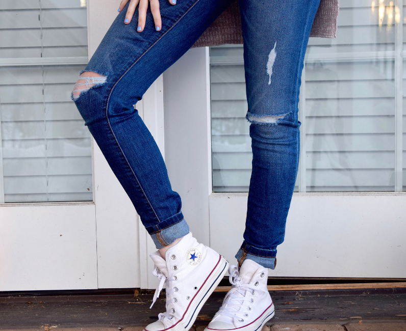 Distressed jeans with Converse