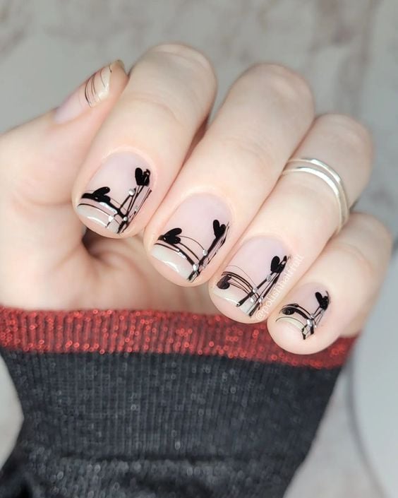 black heart accent nude nails