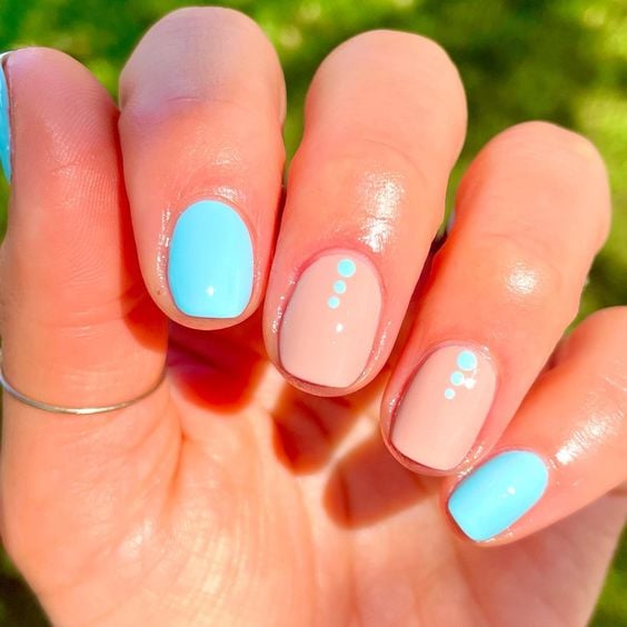 nude and turquoise nails