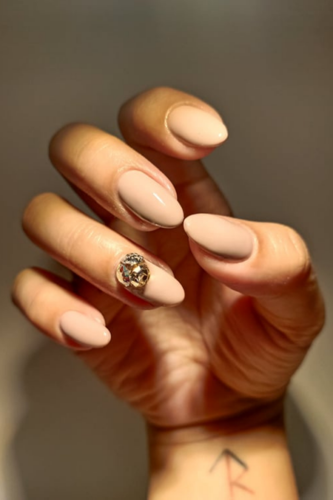 nude nails with gem