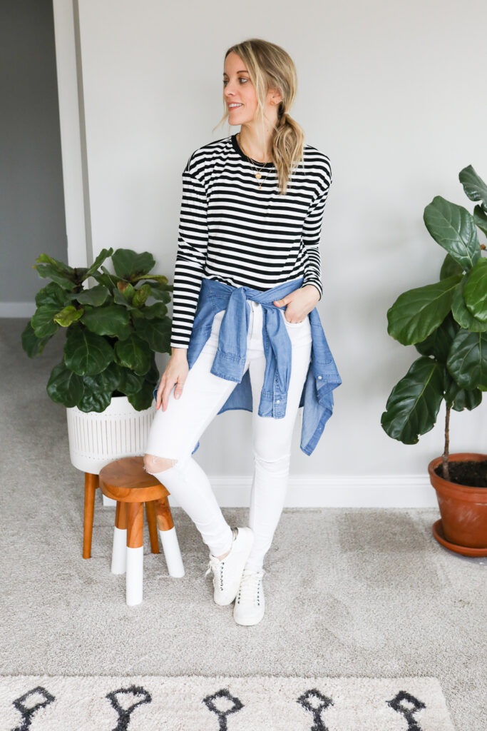 woman wearing White Jeans, Striped Shirt and Sneakers