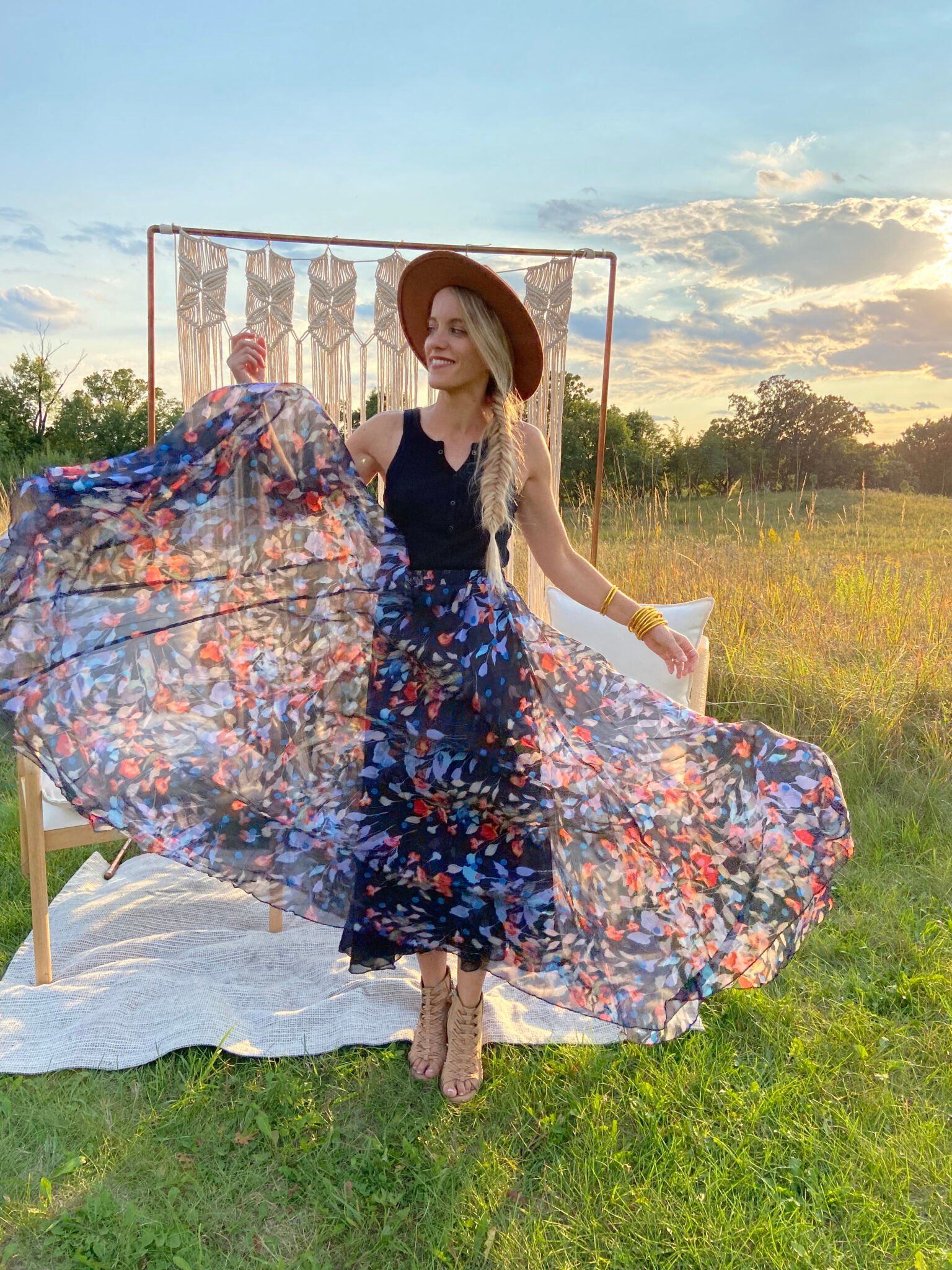 woman wearing flowy maxi skirt and hat