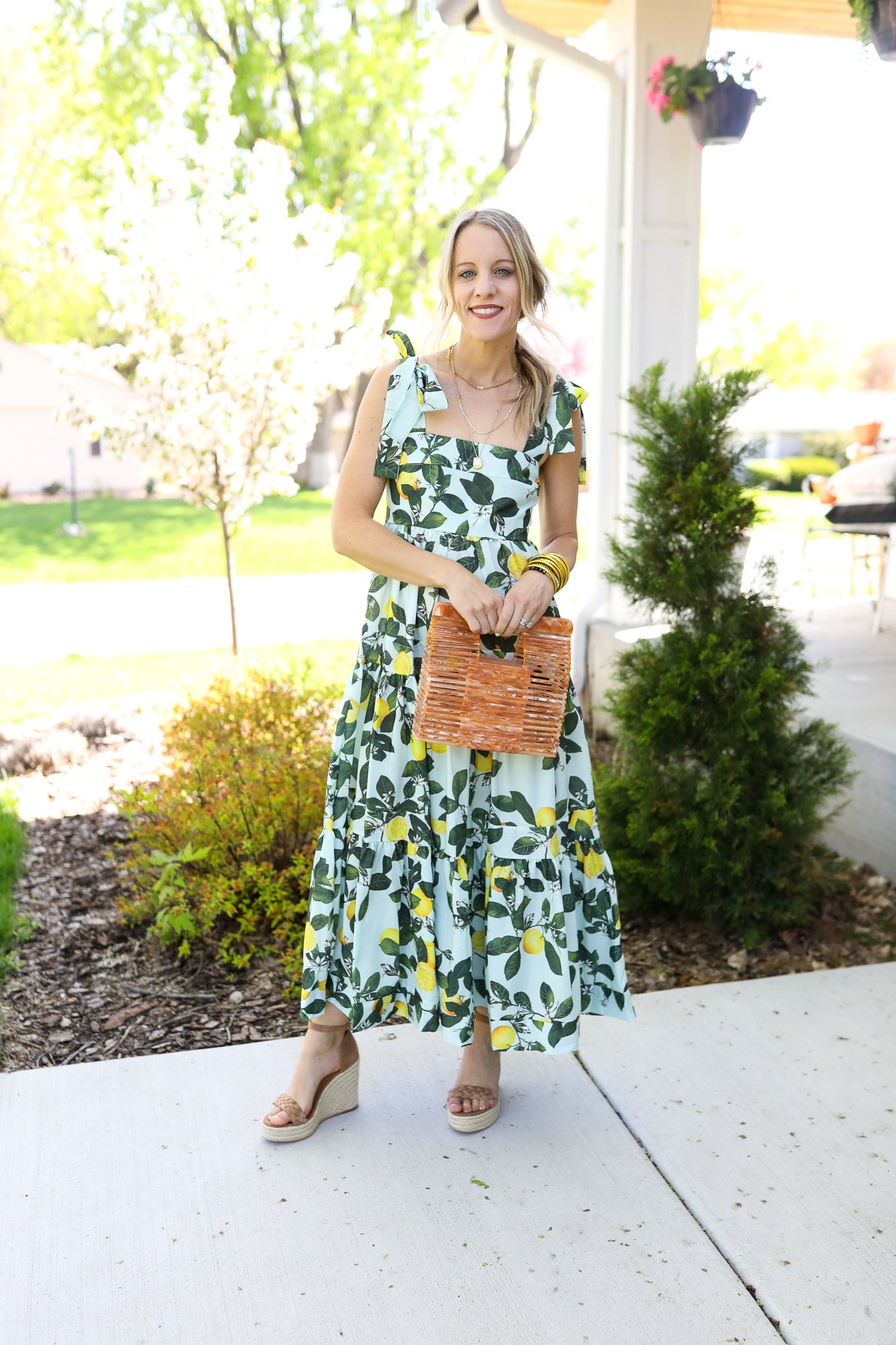 woman in maxi dress with handbag