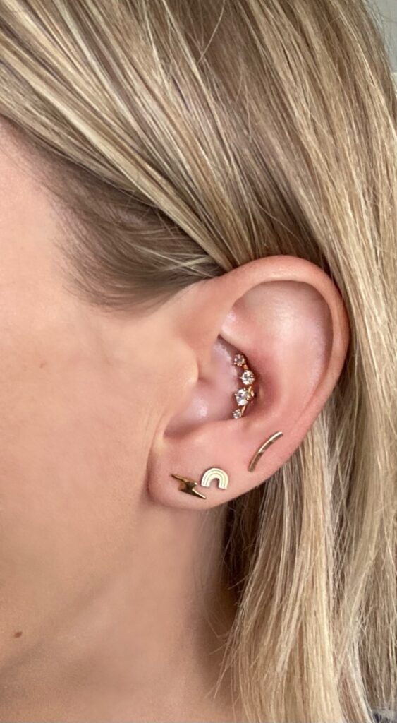 woman with multiple piercings including a conch piercing