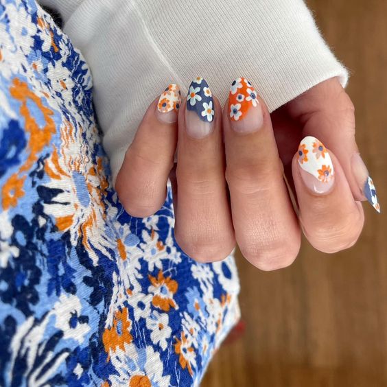 orange and navy flower nails