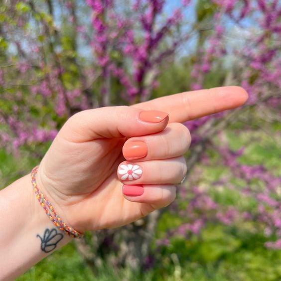 peach daisy mani