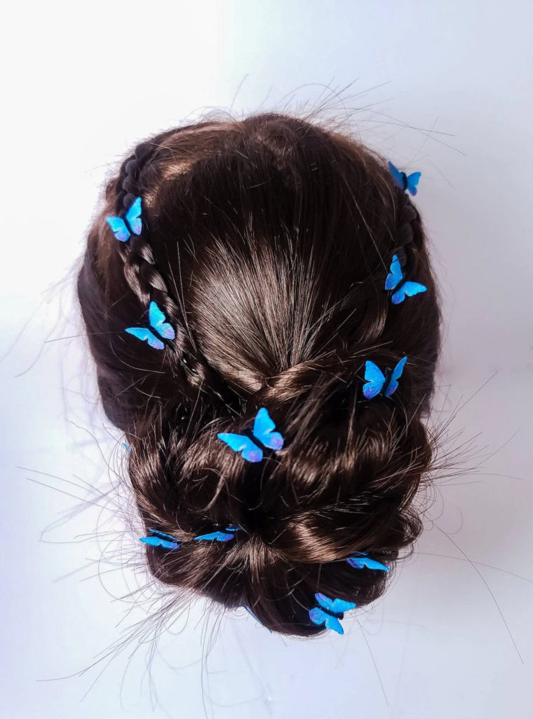 Hairstyle with small blue butterflies
