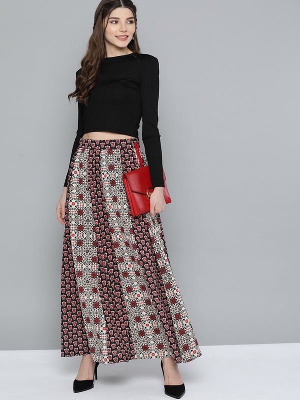 Women wearing a Black & Maroon Ethnic Motifs Printed Pure Cotton Panelled Maxi Skirt