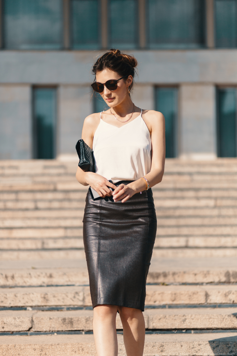 woman wearing black pencil skirt and white blouse