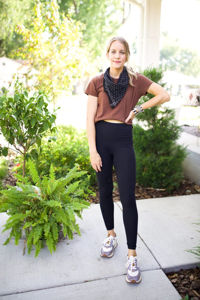 woman wearing leggings, cropped top and bandana