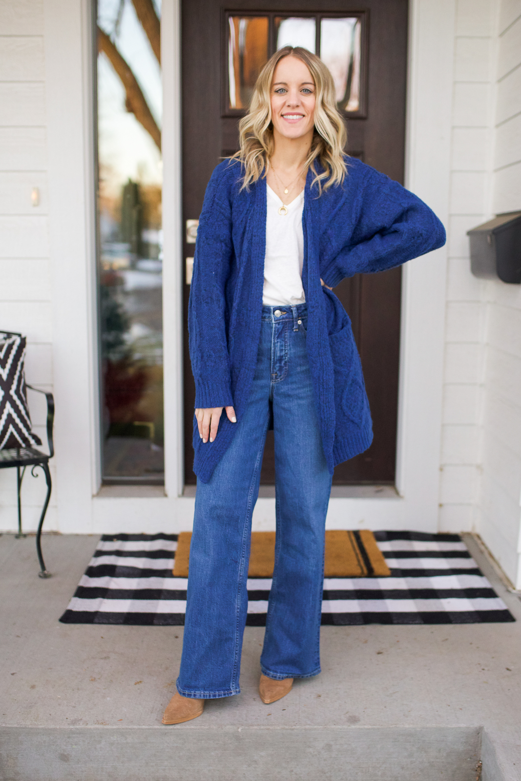 flare jeans and blue cardigan