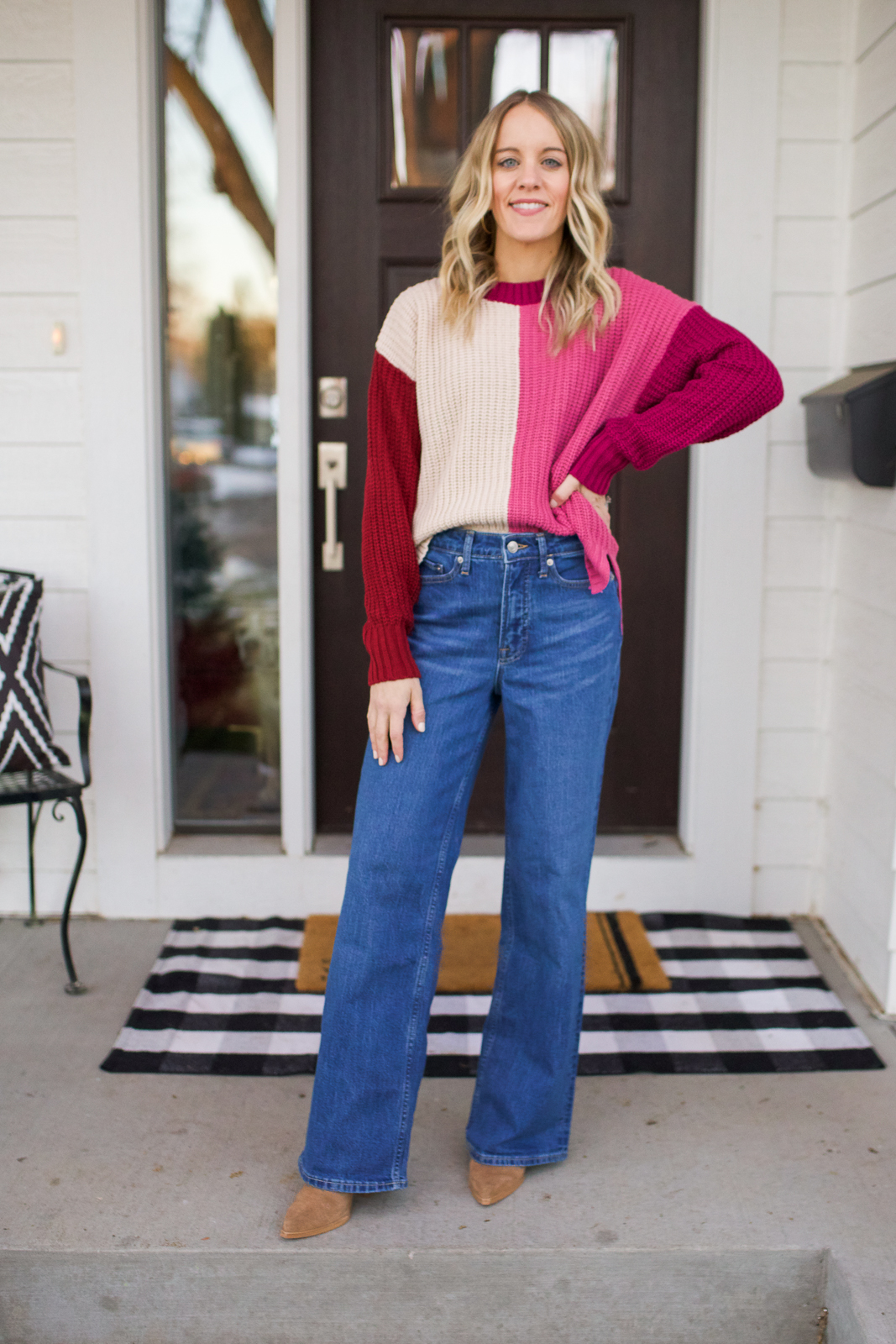 color block sweater and flare jeans
