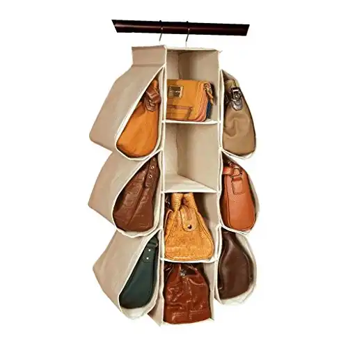Organizing purses and bags can be difficult. Lining them up on shelves and  using bookends will keep them standing up. @…