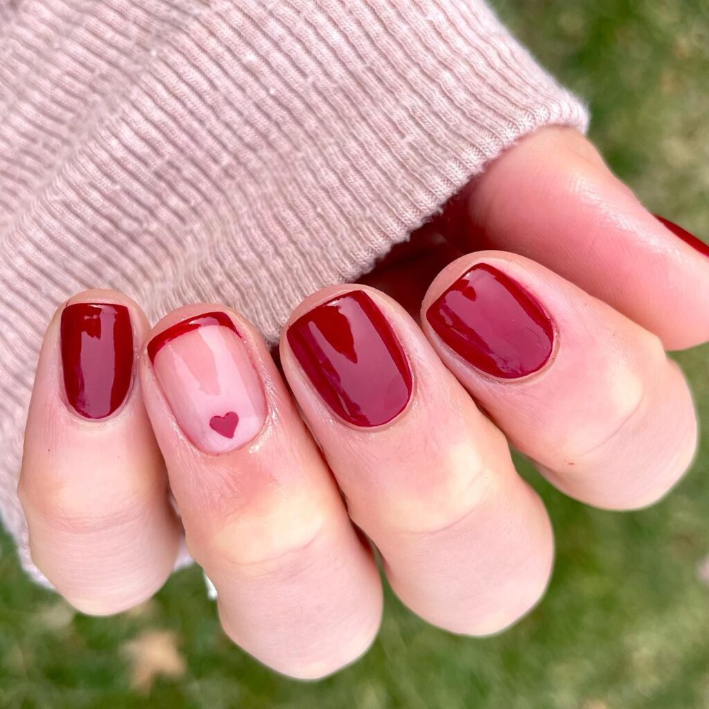 Dark red heart nails