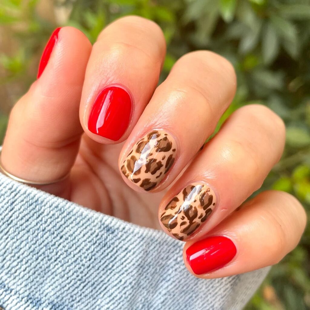 leopard and red nails