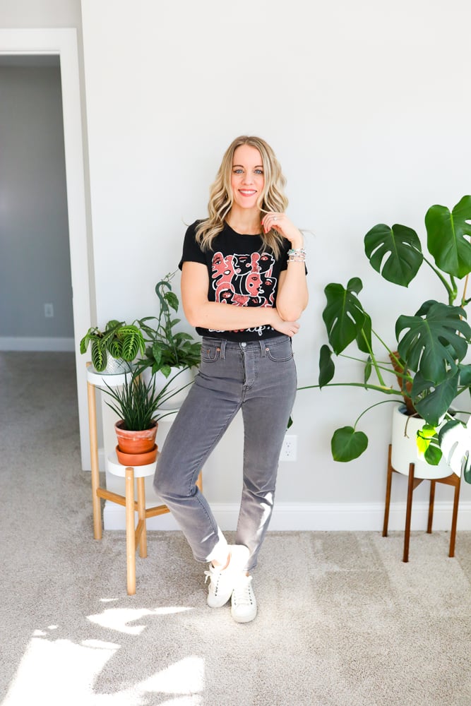 grey jeans and graphic tee