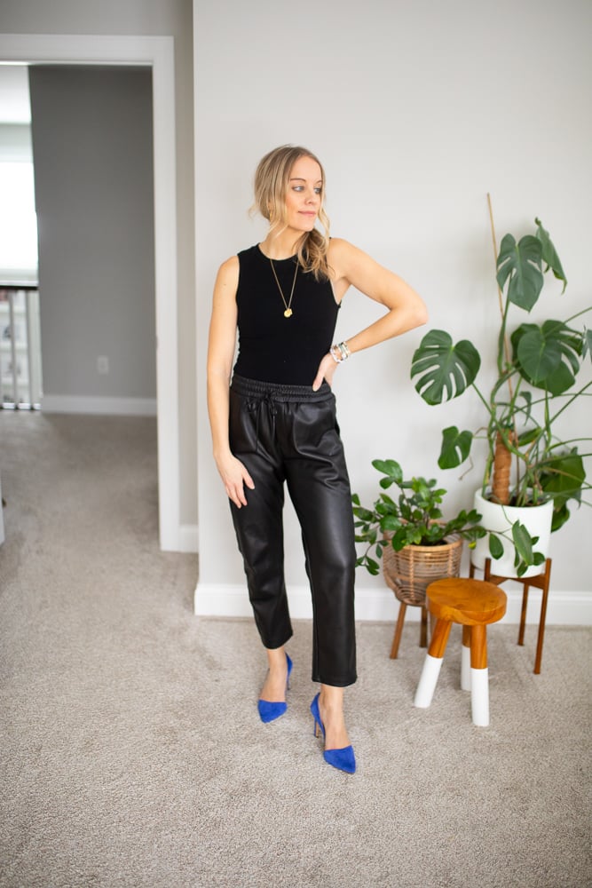 black bodysuit, black faux leather joggers and heels