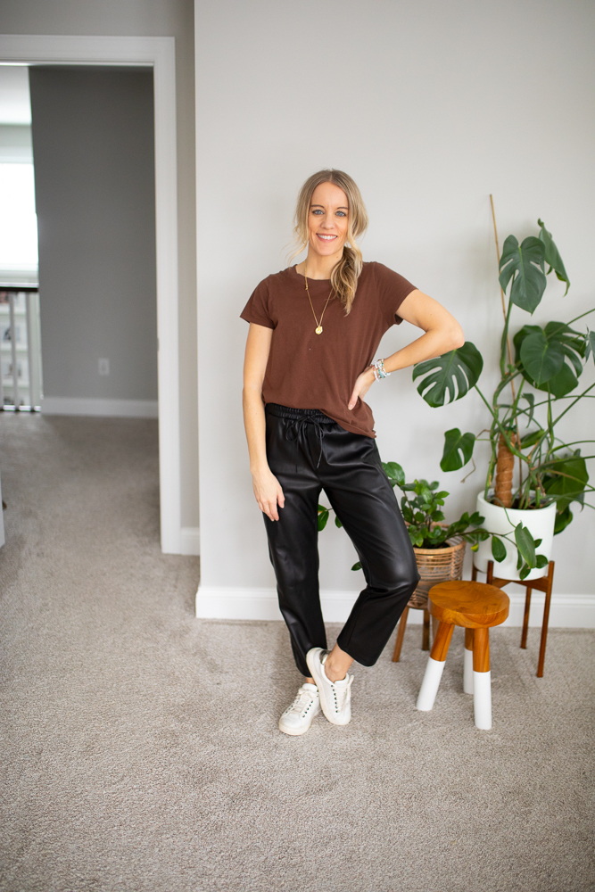 faux leather joggers with solid tee and white sneakers
