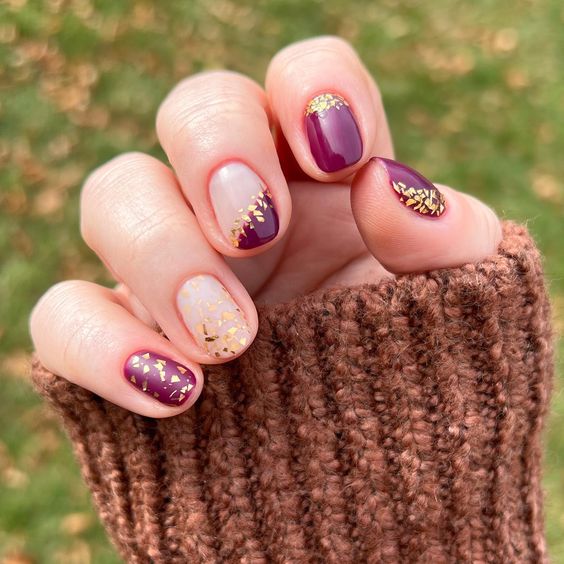 maroon and gold fleck nails