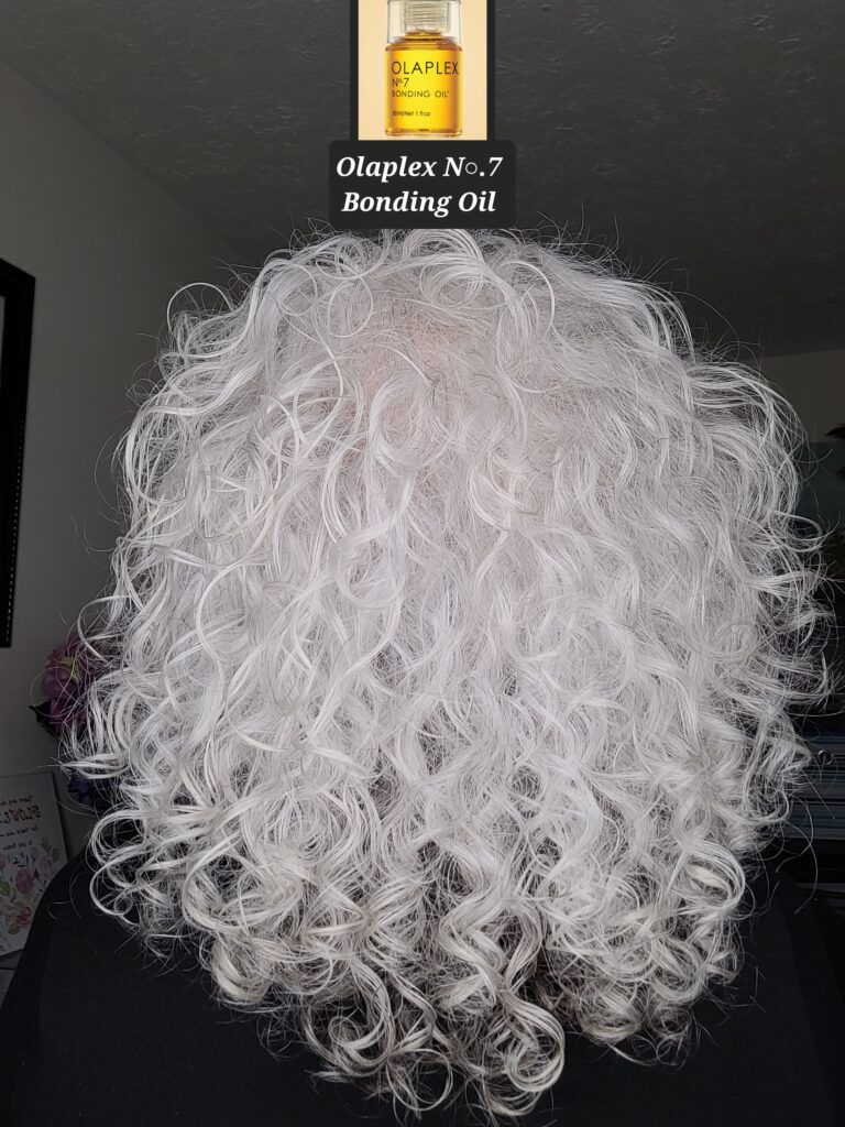Woman with silver hair after using Olaplex bonding oil