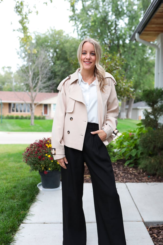 woman in cropped trench coat