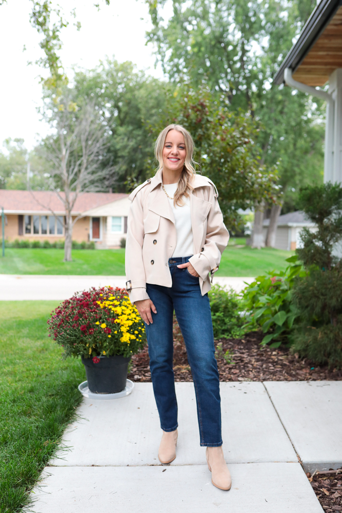 woman in straight leg jeans, cropped trench and white tee
