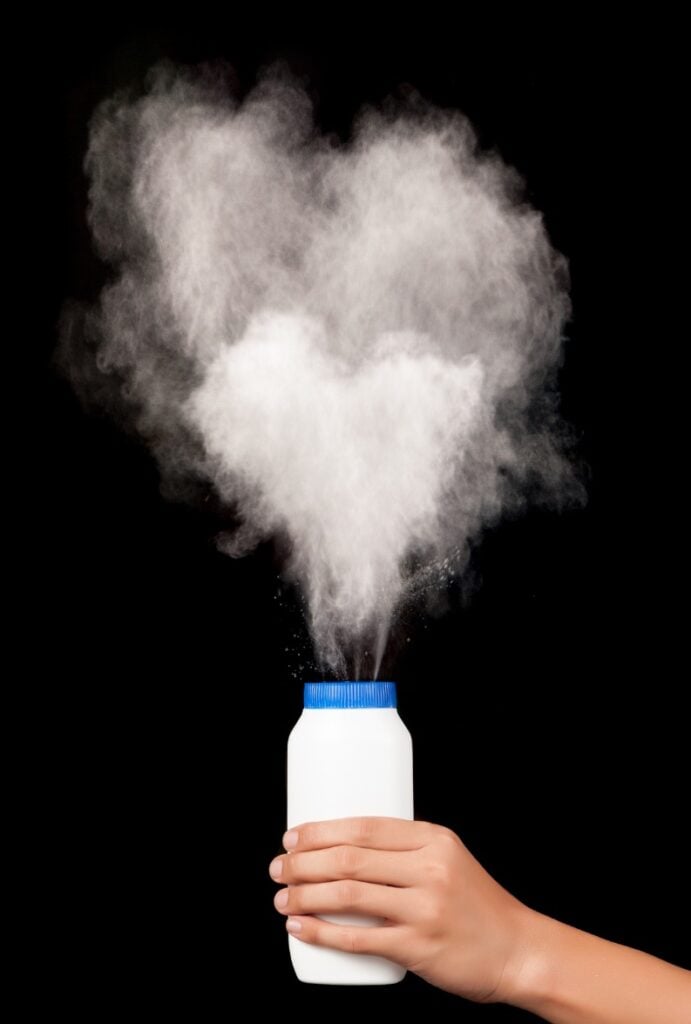 Baby powder squeezed into the air