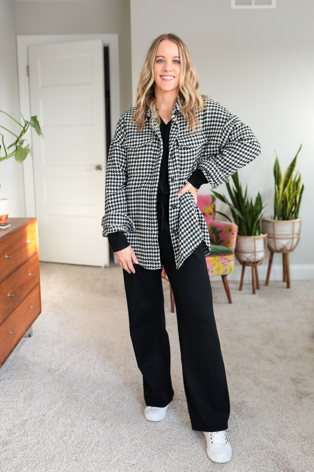 woman wearing black knit lounge with houndstooth shacket