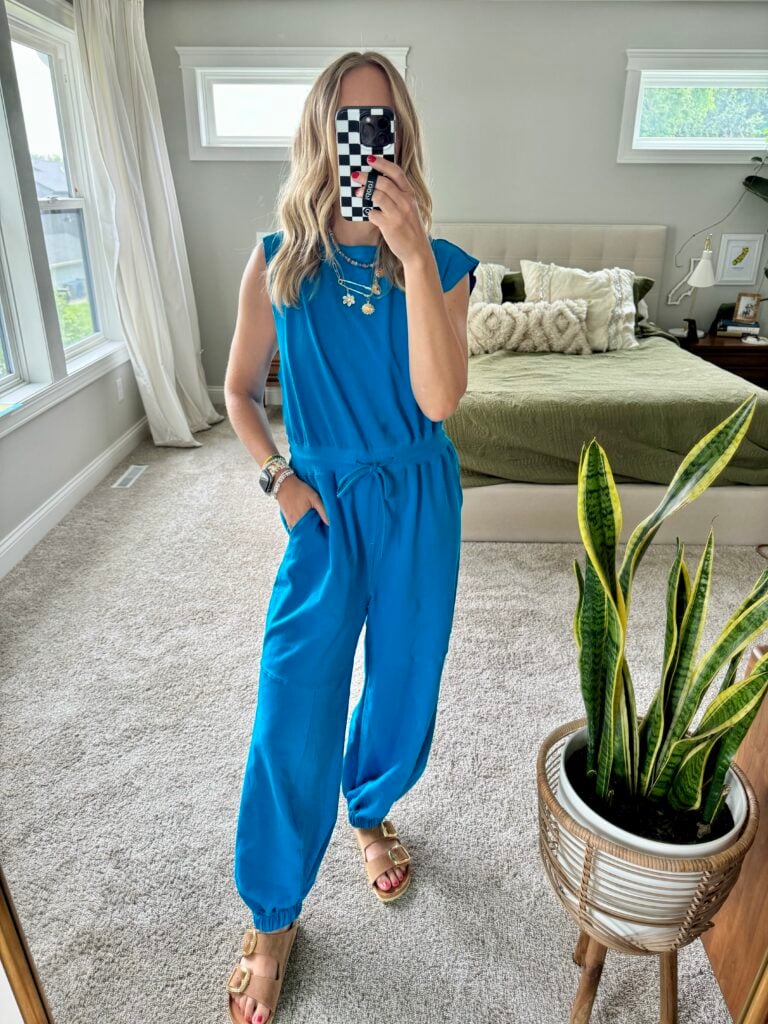 Woman in blue Free People lookalike romper.