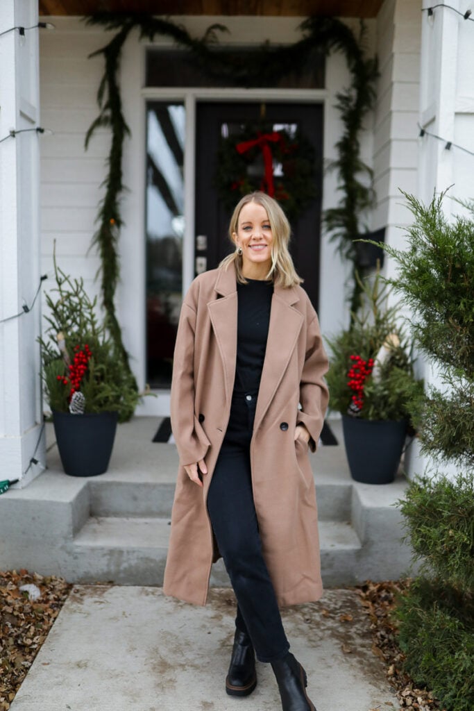 Woman wearing long overcoat