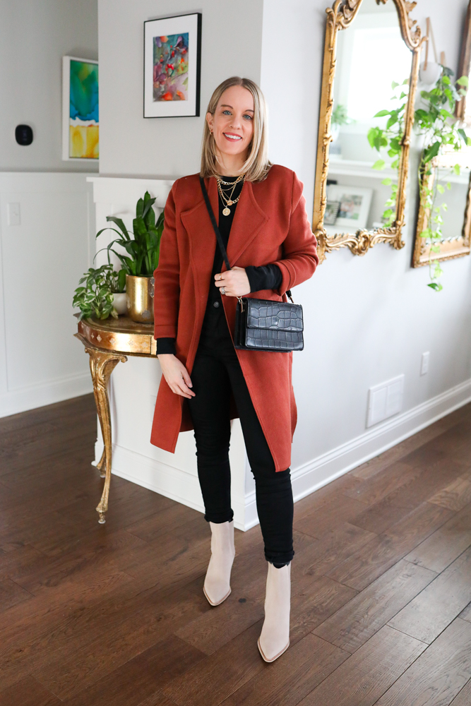 woman wearing black long sleeve, jeans, coatigan, and booties