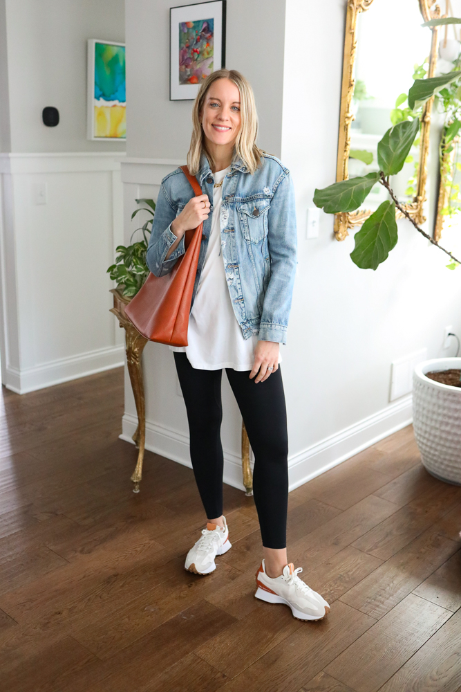 woman wearing distressed jacket