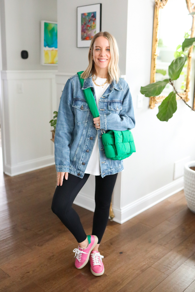 woman wearing medium wash denim jacket