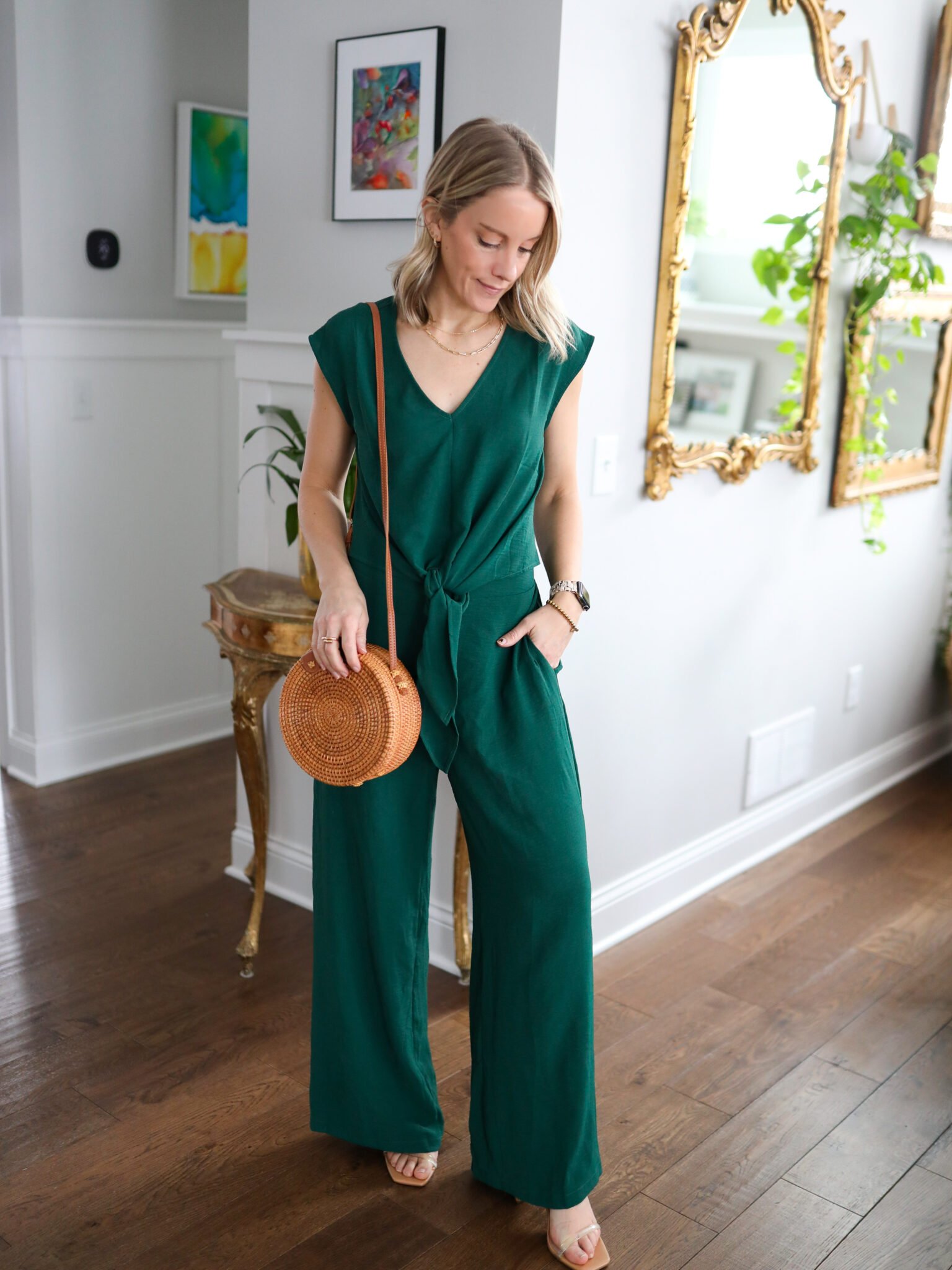 woman wearing resort wear look consisting of a green linen pant set