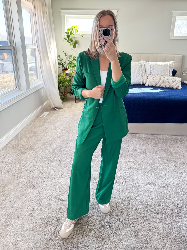 woman wearing green blazer set with neutral shoes