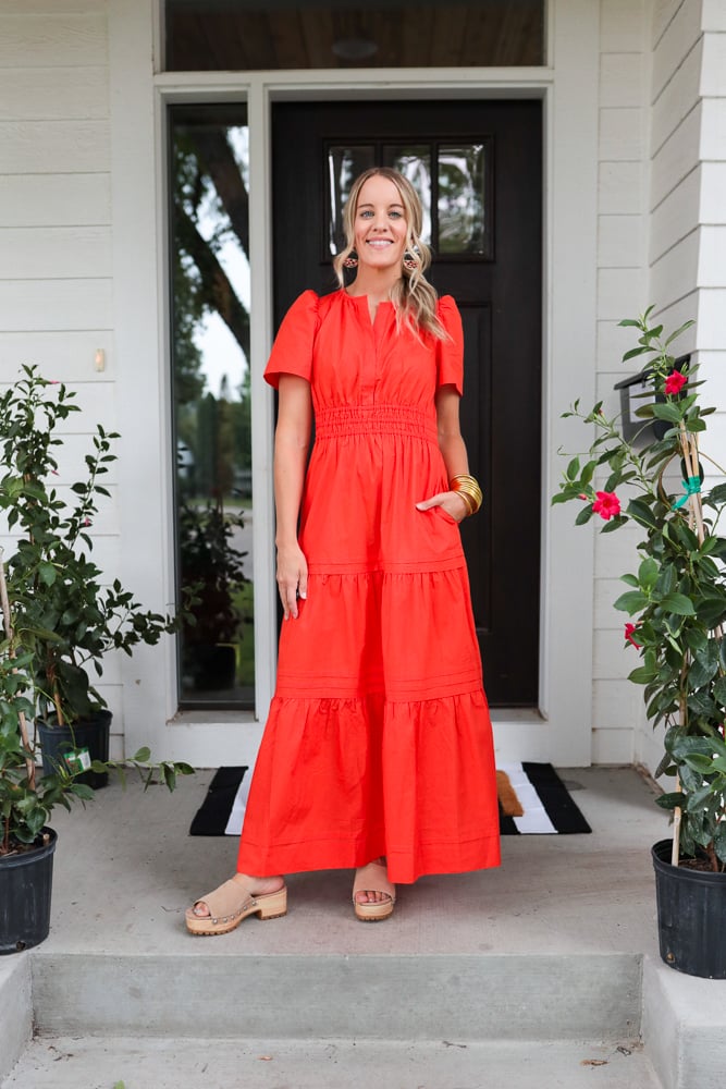 woman wearing red maxi dress