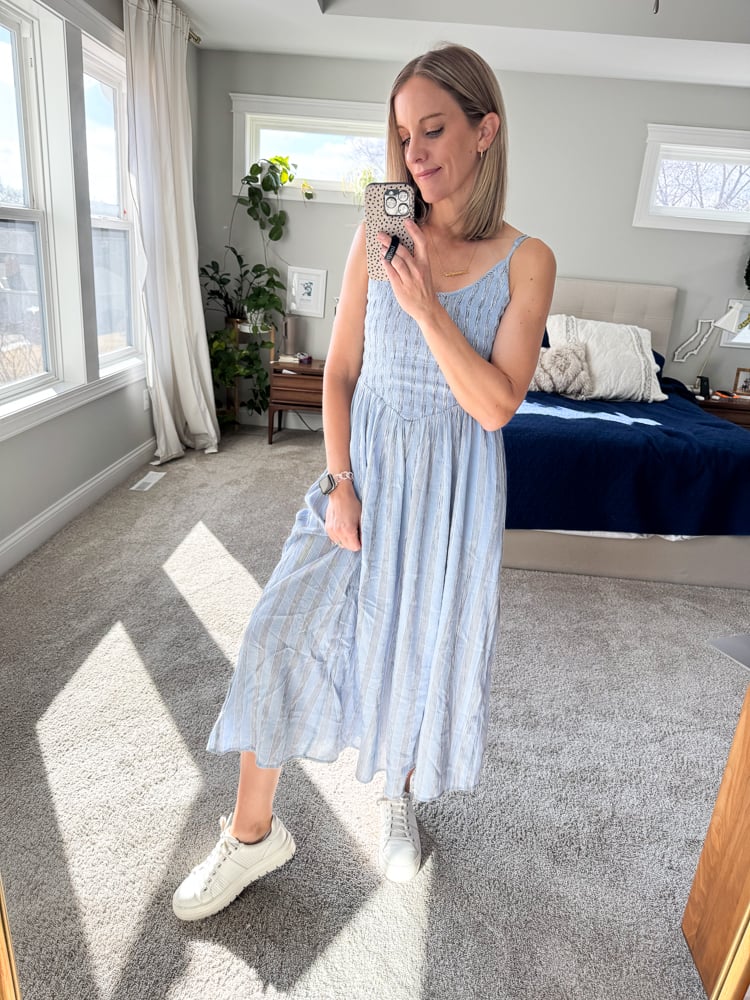 woman wearing blue midi dress